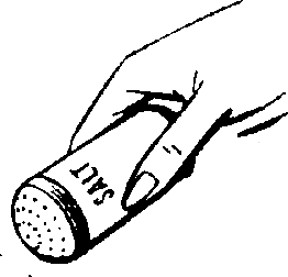 Hand sprinkling salt.